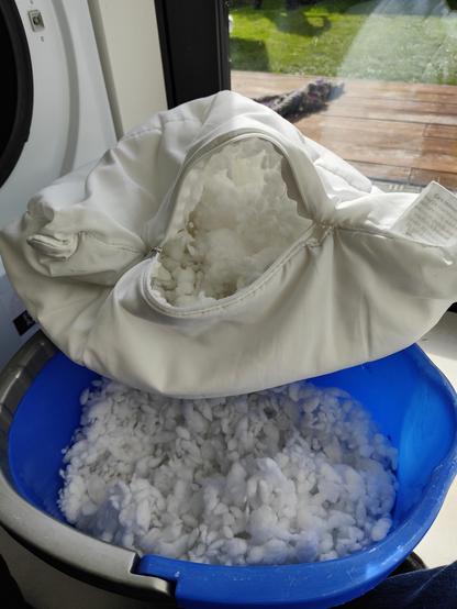 Restuffing the pillow with rather dry foam scraps. 